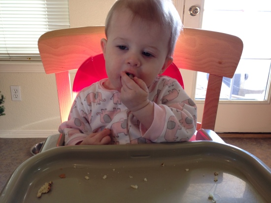 baby eats pancakes
